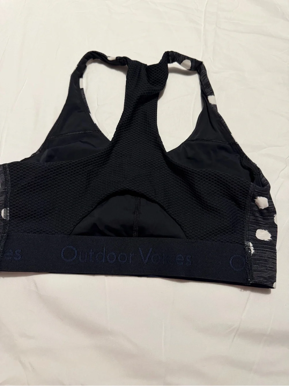 Women’s Racerback Sports Bra - Black & White Polka Dot